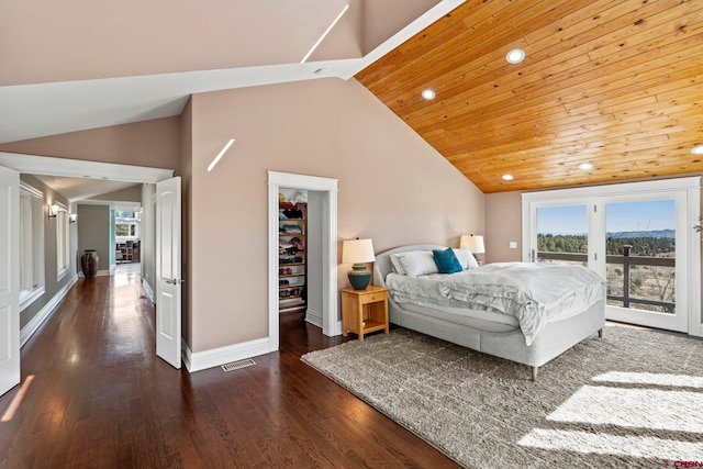 bedroom with baseboards, visible vents, dark wood-style floors, access to exterior, and high vaulted ceiling