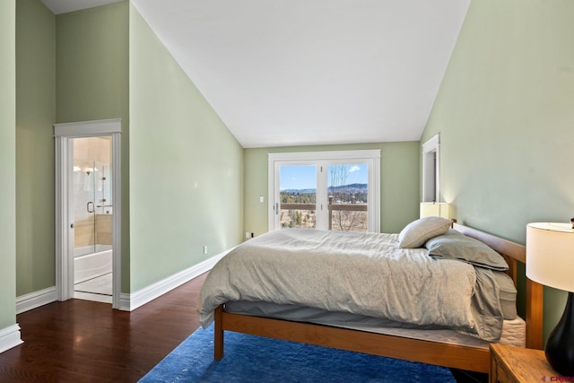 bedroom featuring baseboards, ensuite bath, wood finished floors, access to exterior, and high vaulted ceiling