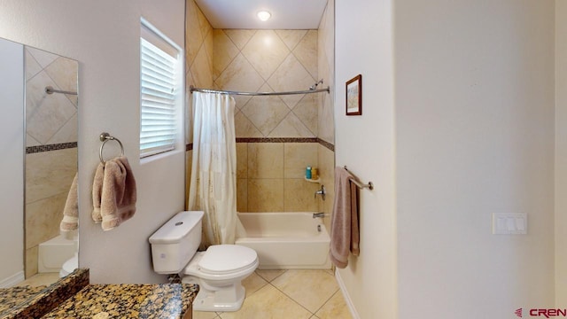 bathroom featuring toilet, shower / bathtub combination with curtain, baseboards, and tile patterned floors