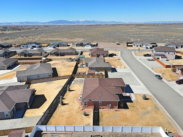 bird's eye view with a residential view and a mountain view