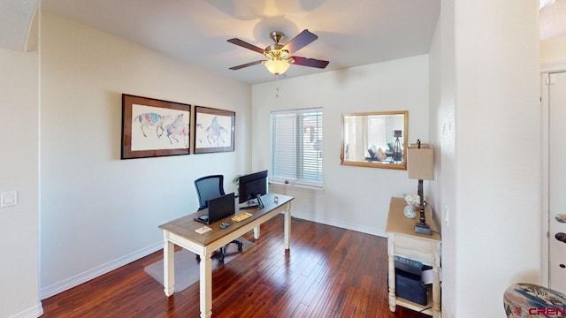 office featuring a ceiling fan, baseboards, and wood finished floors