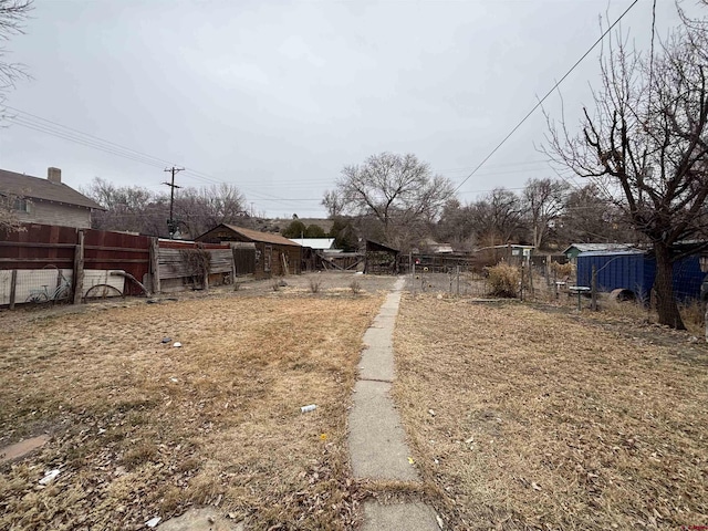 view of yard featuring fence