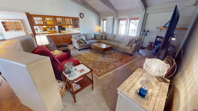 living room featuring light carpet, high vaulted ceiling, beamed ceiling, and wooden ceiling