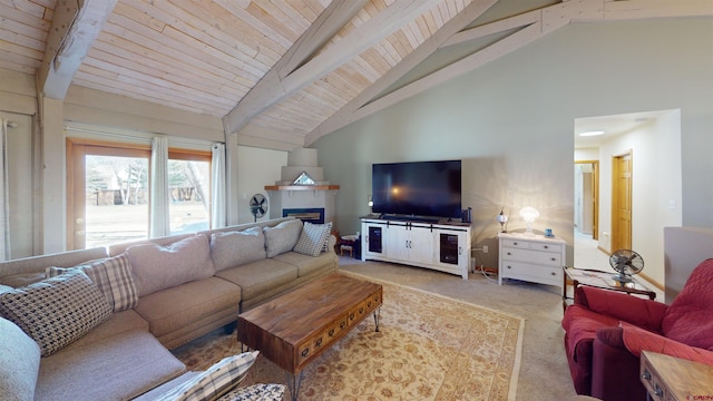 living area with high vaulted ceiling, a fireplace, carpet flooring, and beam ceiling