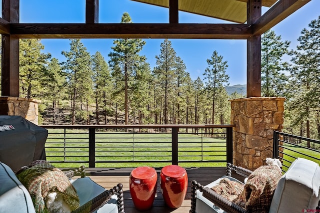 balcony featuring an outdoor living space and area for grilling