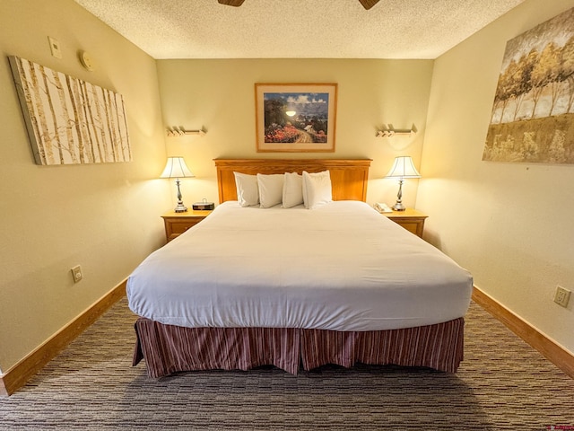 bedroom featuring a ceiling fan, a textured ceiling, baseboards, and carpet flooring