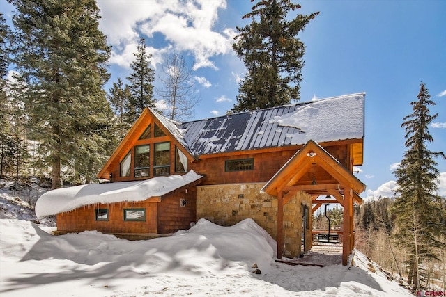 view of front of property with metal roof