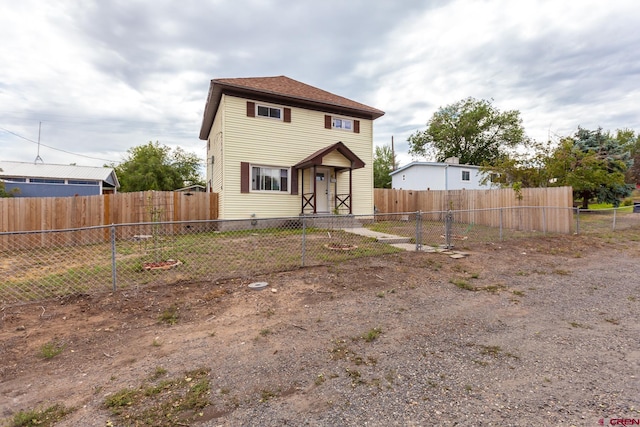 view of front of home featuring fence private yard and entry steps