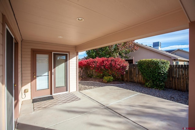 view of patio / terrace featuring fence