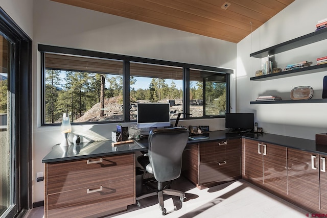 office with lofted ceiling and wood ceiling