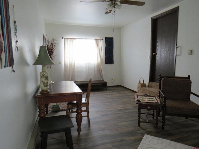 office space featuring ceiling fan, baseboards, and dark wood finished floors