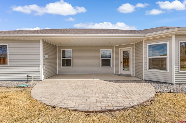 property entrance with a patio