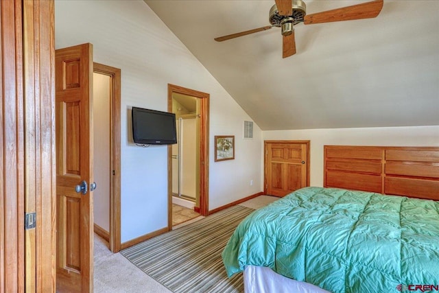 bedroom with baseboards, visible vents, vaulted ceiling, and light colored carpet