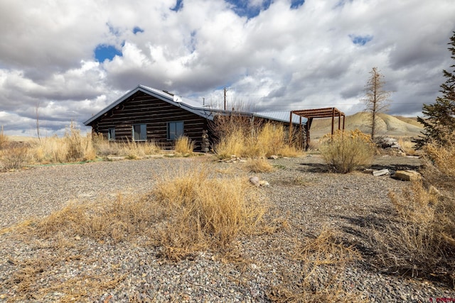 view of home's exterior featuring log exterior