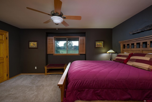 bedroom featuring carpet flooring, ceiling fan, and baseboards