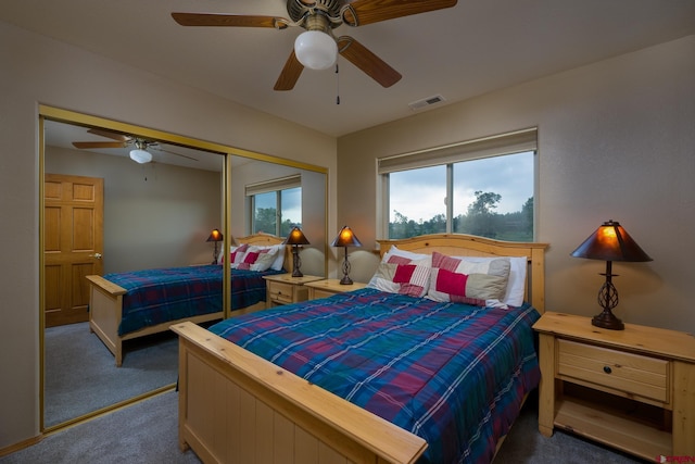 bedroom featuring a ceiling fan, carpet, a closet, and visible vents