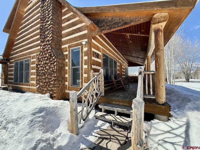 view of snow covered property