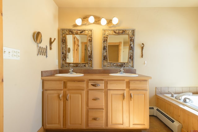 full bathroom with double vanity, a bathing tub, a baseboard radiator, and a sink