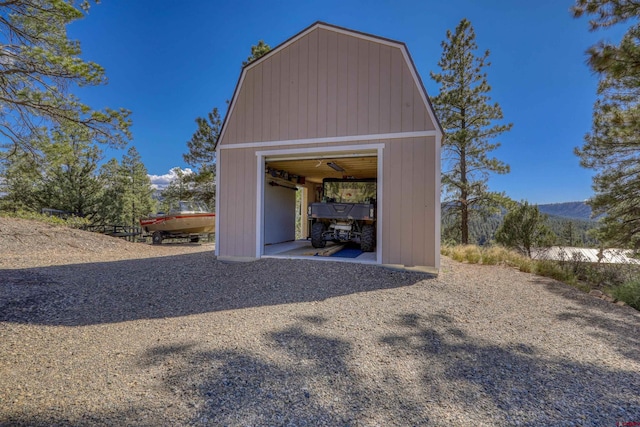 view of outdoor structure with an outbuilding and a mountain view