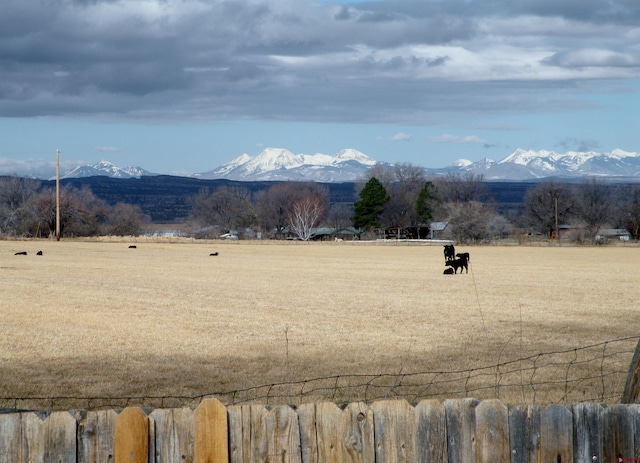 property view of mountains featuring a rural view