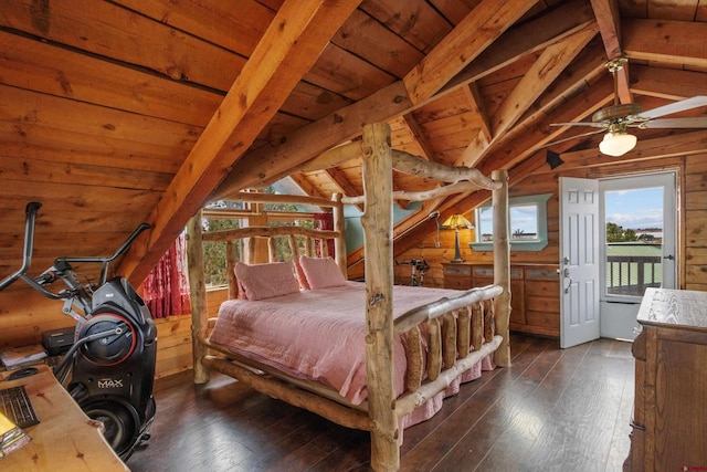 bedroom with lofted ceiling with beams, wood ceiling, wooden walls, and dark wood-style flooring