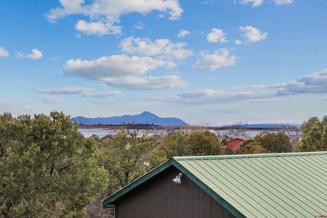 mountain view featuring a water view