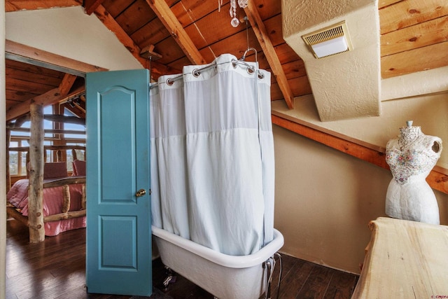 full bath featuring visible vents, wooden ceiling, hardwood / wood-style flooring, and vaulted ceiling with beams