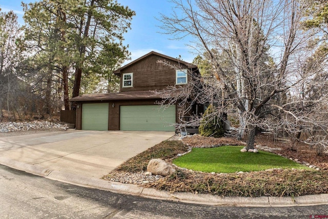 view of front facade with an attached garage and concrete driveway