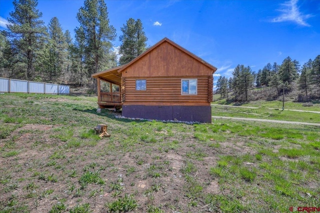 view of home's exterior featuring log exterior