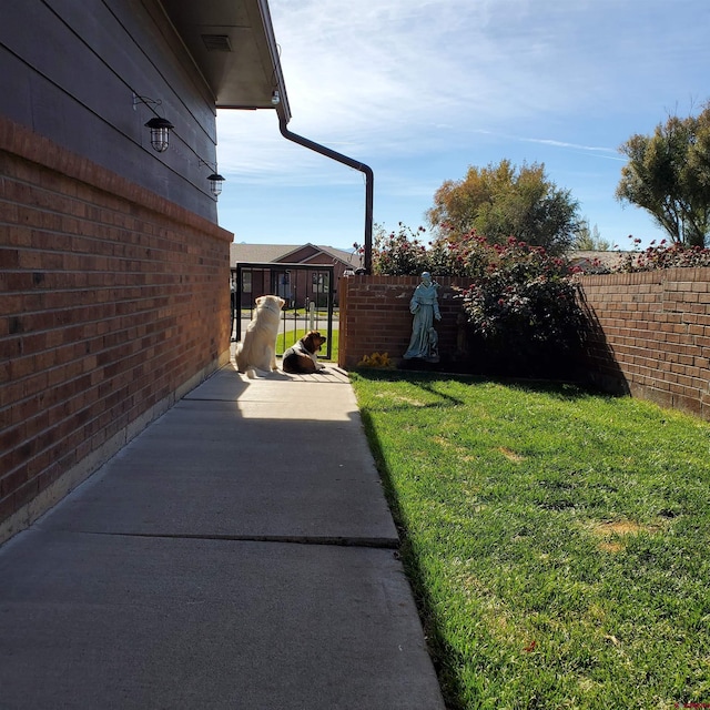 view of yard featuring fence