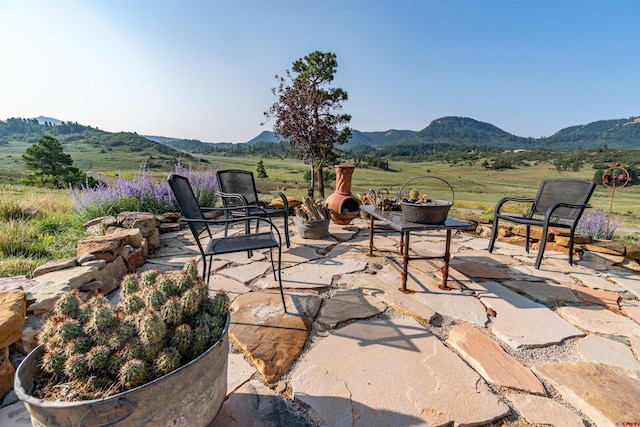 view of patio featuring a mountain view