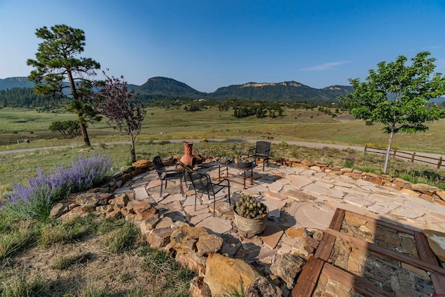 view of patio featuring a mountain view