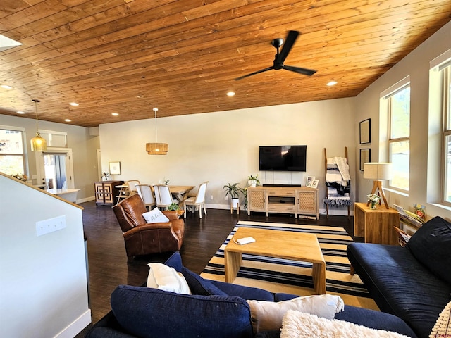 living area with recessed lighting, wood ceiling, and wood finished floors