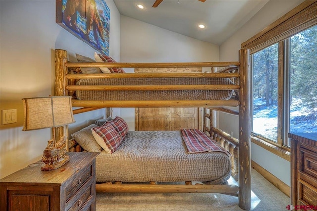 bedroom with vaulted ceiling, baseboards, carpet flooring, and recessed lighting