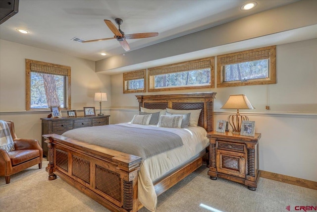 bedroom with recessed lighting, visible vents, a ceiling fan, light carpet, and baseboards