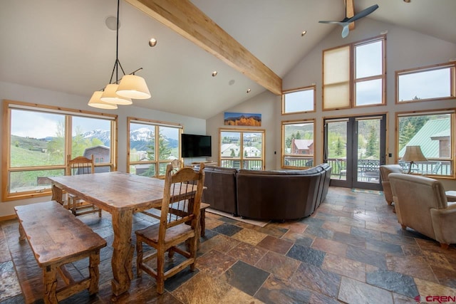 dining room featuring stone tile flooring, french doors, high vaulted ceiling, beam ceiling, and recessed lighting