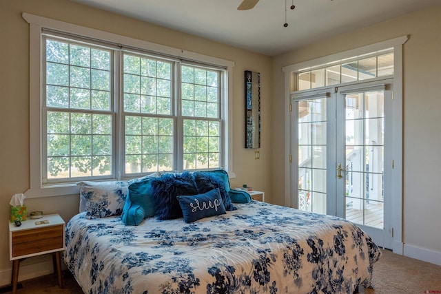 bedroom featuring ceiling fan, carpet floors, baseboards, access to exterior, and french doors