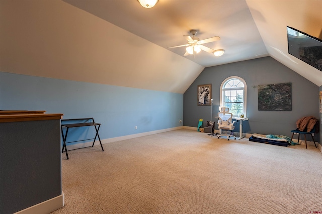 playroom featuring carpet flooring, vaulted ceiling, baseboards, and ceiling fan