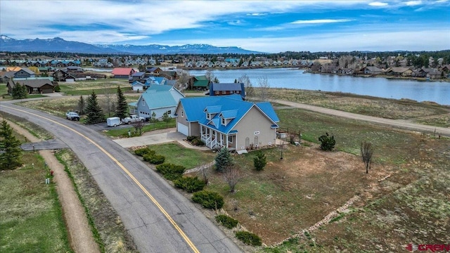 381 Northlake Ave, Pagosa Springs, CO 81147 - aerial view featuring a residential view and a water and mountain view