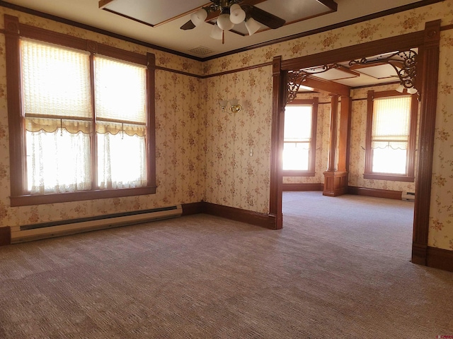 carpeted spare room with wallpapered walls, baseboards, a baseboard heating unit, and a ceiling fan