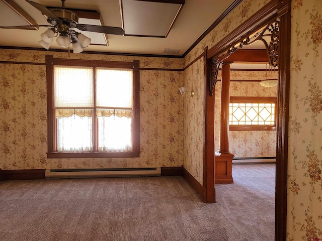 carpeted empty room featuring ceiling fan, a baseboard heating unit, baseboards, baseboard heating, and wallpapered walls