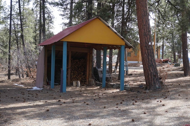 view of property's community with an outbuilding and an outdoor structure