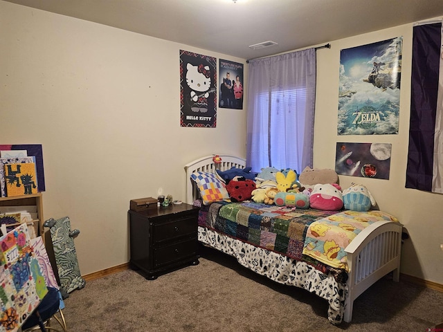 bedroom featuring carpet floors, visible vents, and baseboards