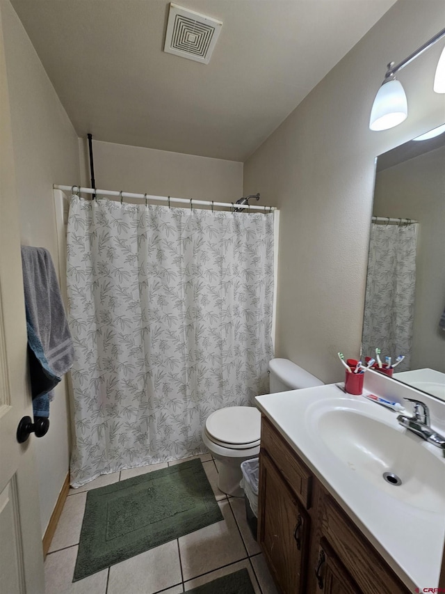 full bathroom featuring visible vents, toilet, a shower with curtain, tile patterned flooring, and vanity