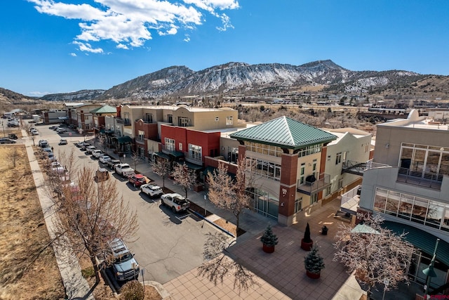 birds eye view of property with a residential view and a mountain view