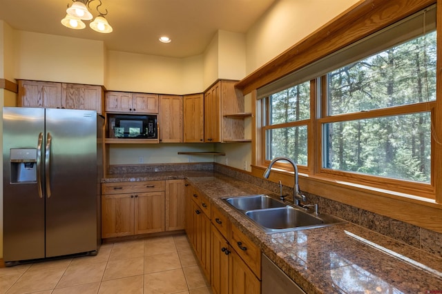 kitchen featuring stainless steel refrigerator with ice dispenser, light tile patterned floors, open shelves, a sink, and black microwave