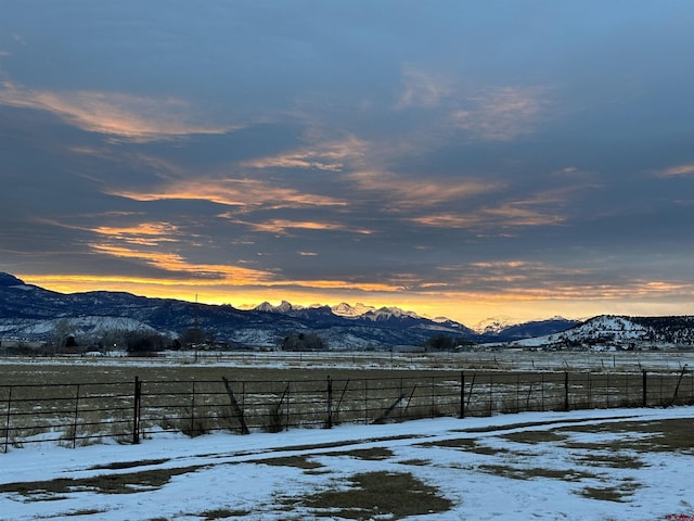 property view of mountains with a rural view