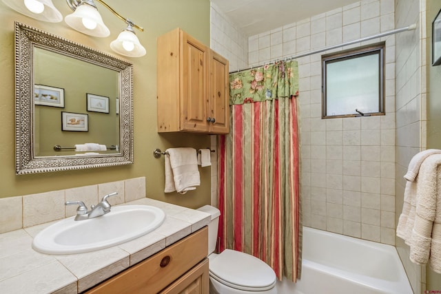 full bathroom with shower / bath combination with curtain, toilet, and vanity