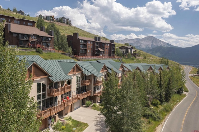 aerial view with a mountain view and a residential view