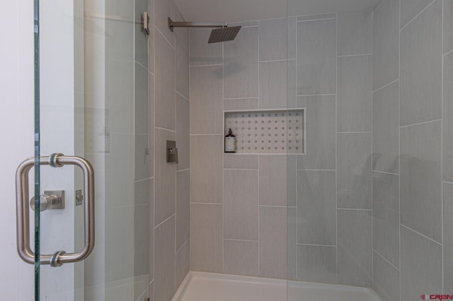 full bathroom with a stall shower